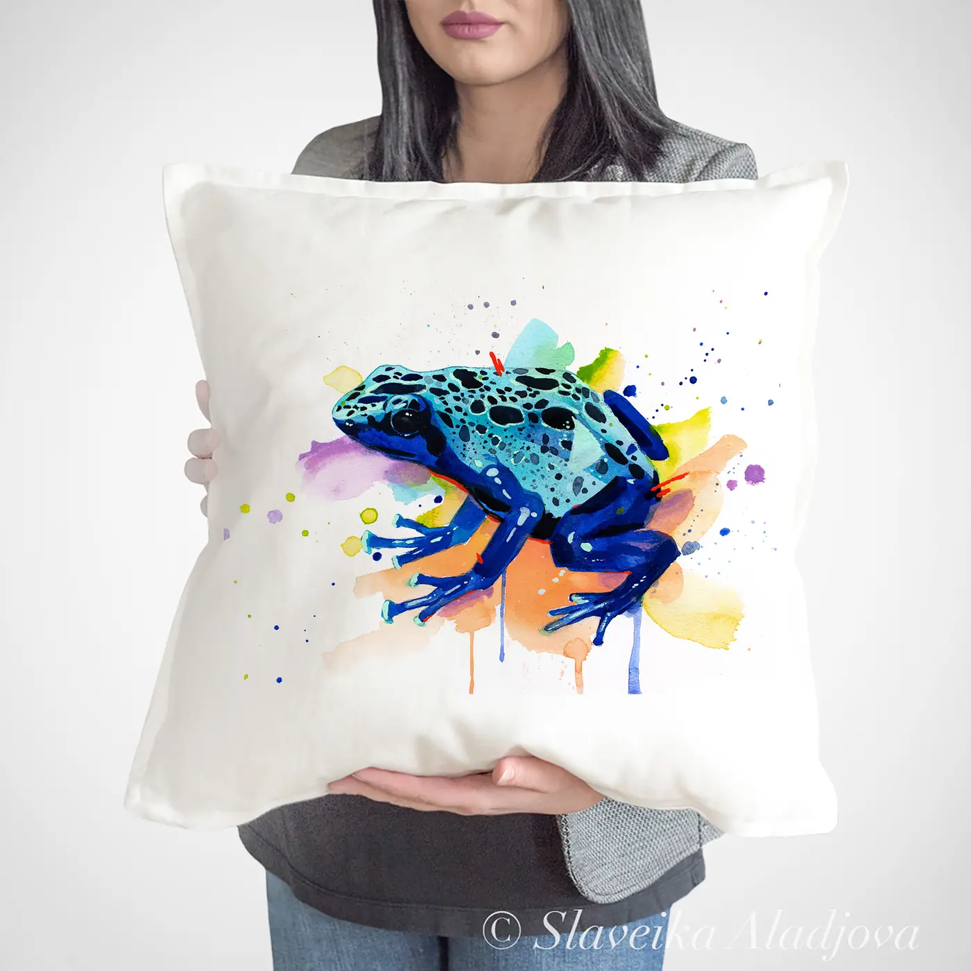 Cushion with a watercolour blue poison dart frog print