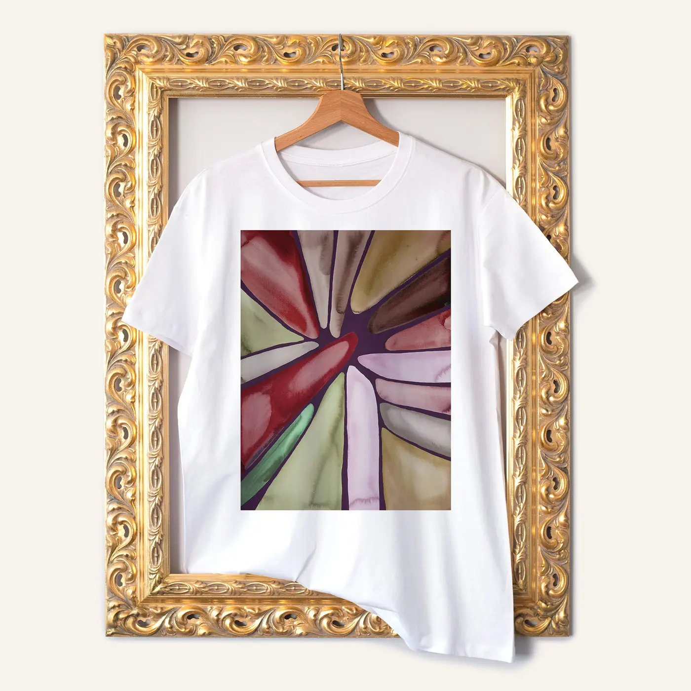 White t-shirt with a watercolour abstract in burgundy and olive print