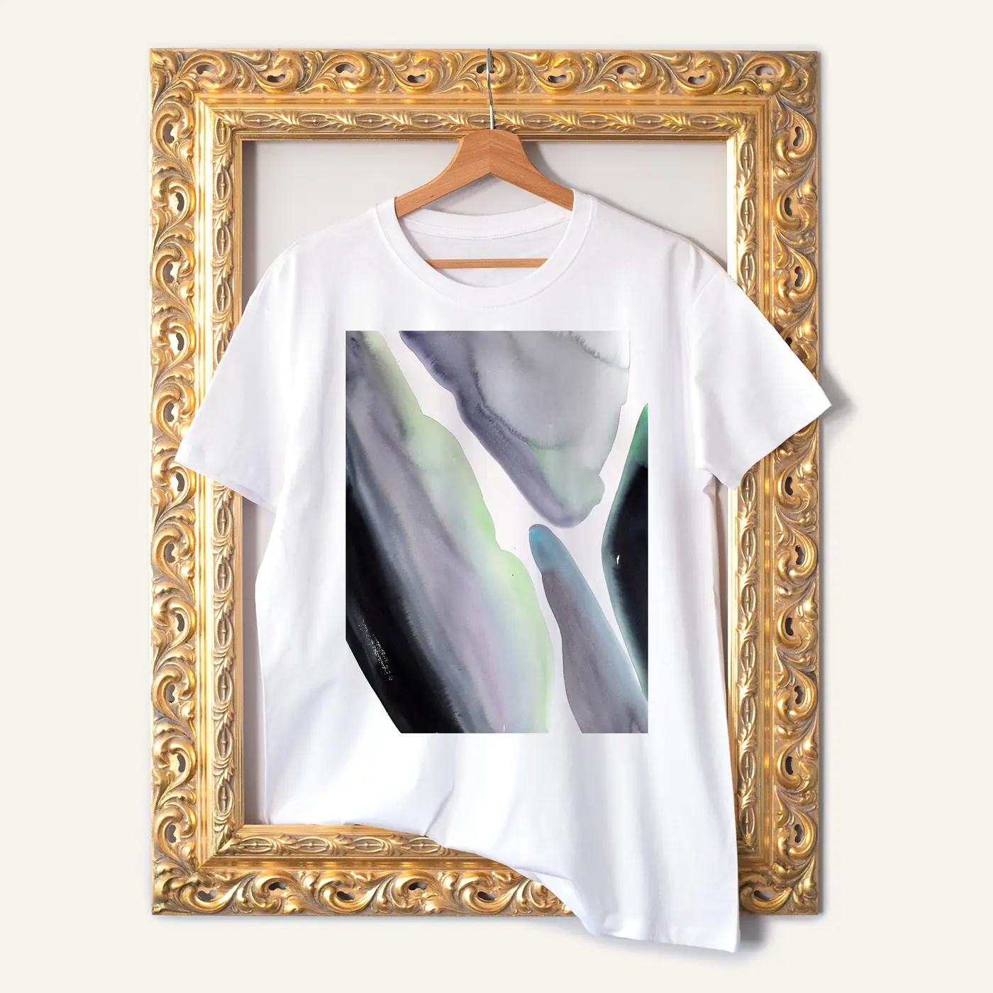 White t-shirt with a watercolour abstract in grey and green print