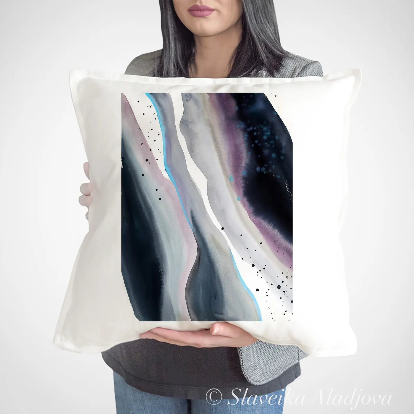 Cushion with a watercolour abstract in grey and ink print