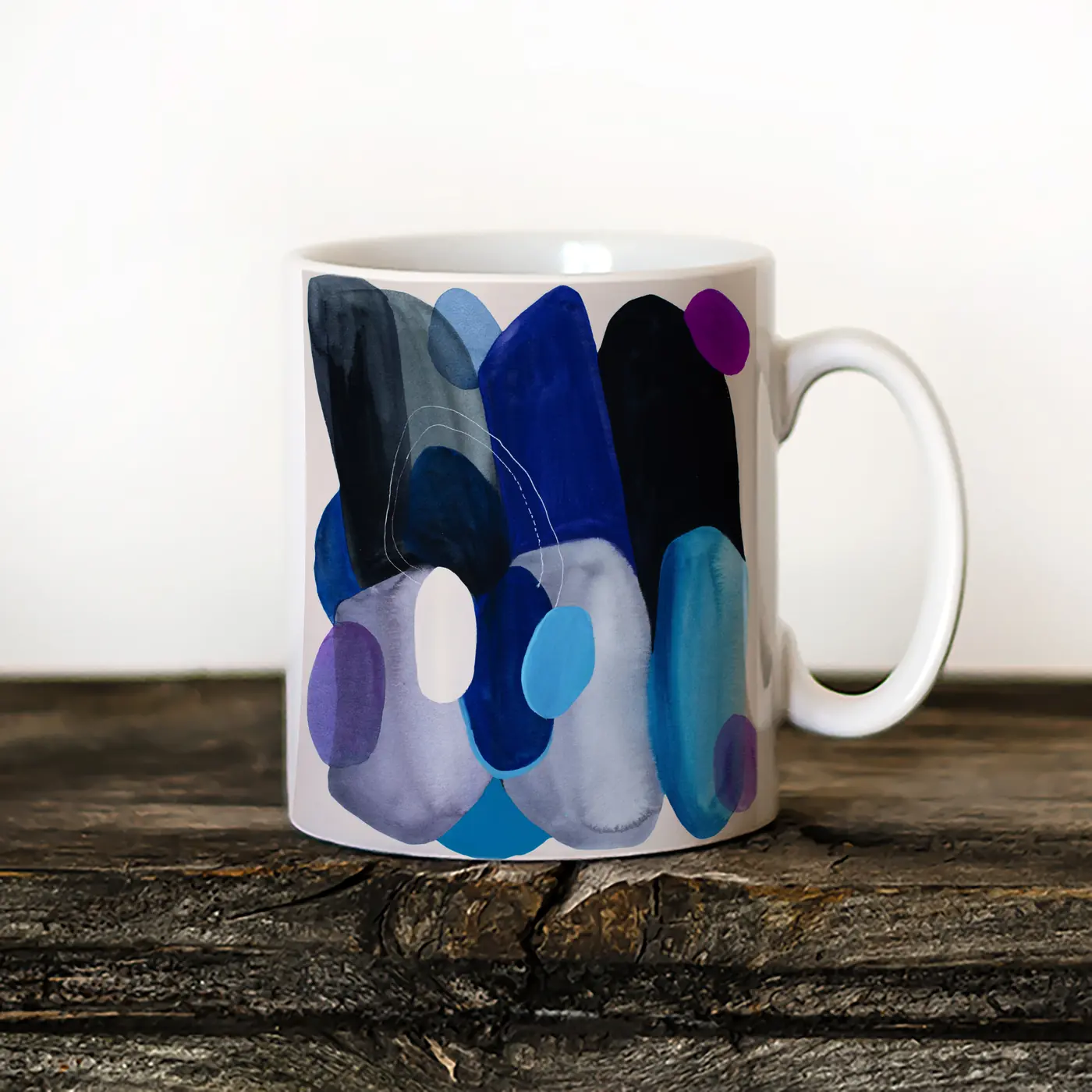Ceramic mug with a watercolour abstract in blue and grey print