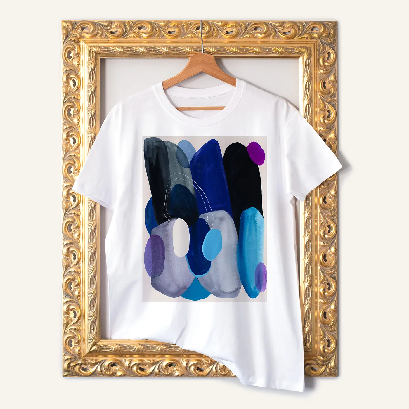White t-shirt with a watercolour abstract in blue and grey print