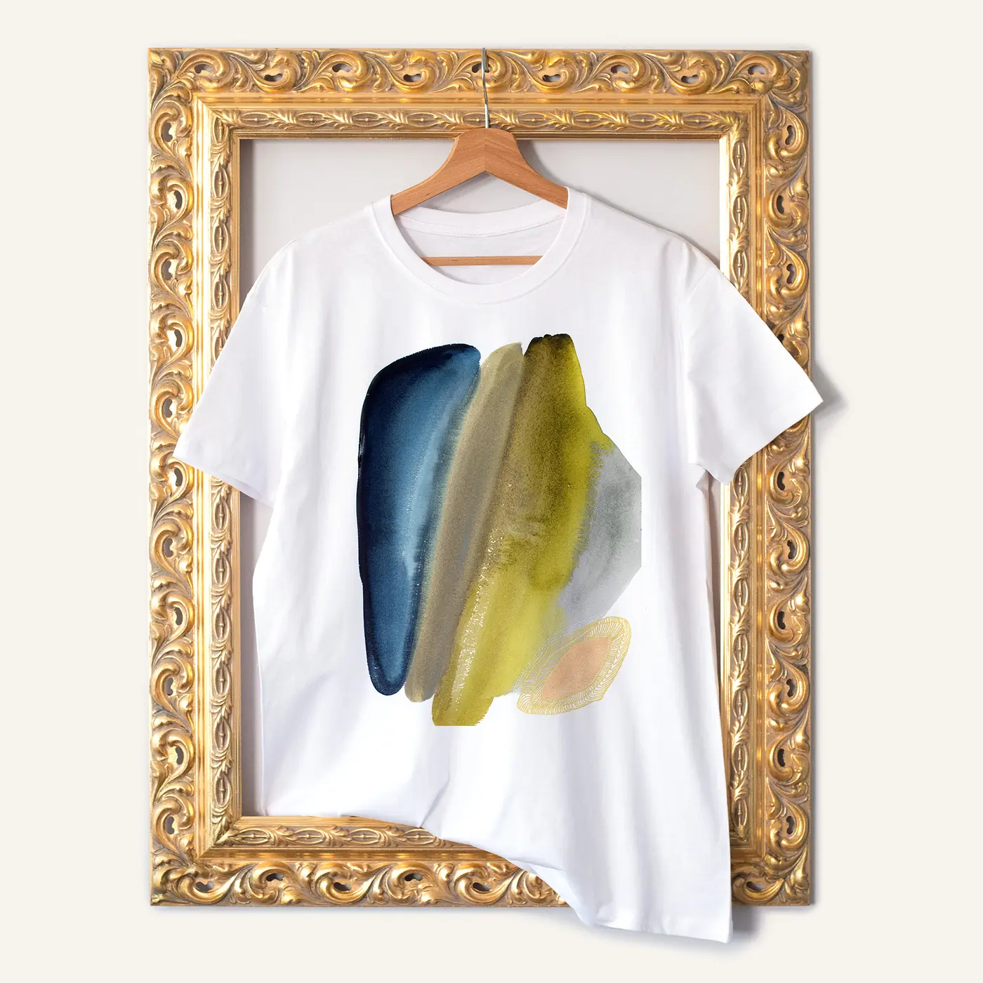 White t-shirt with a watercolour abstract in navy and yellow print