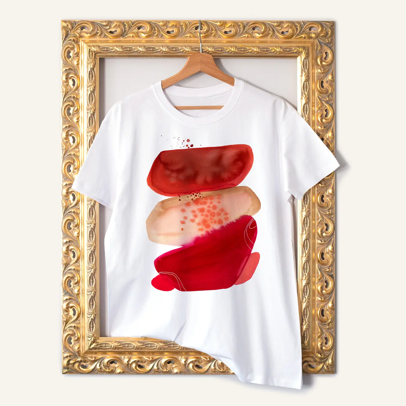 White t-shirt with a watercolour abstract in red and coral print