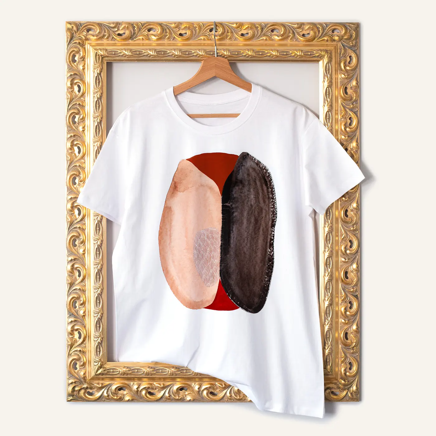 White t-shirt with a watercolour abstract in peach and brown print