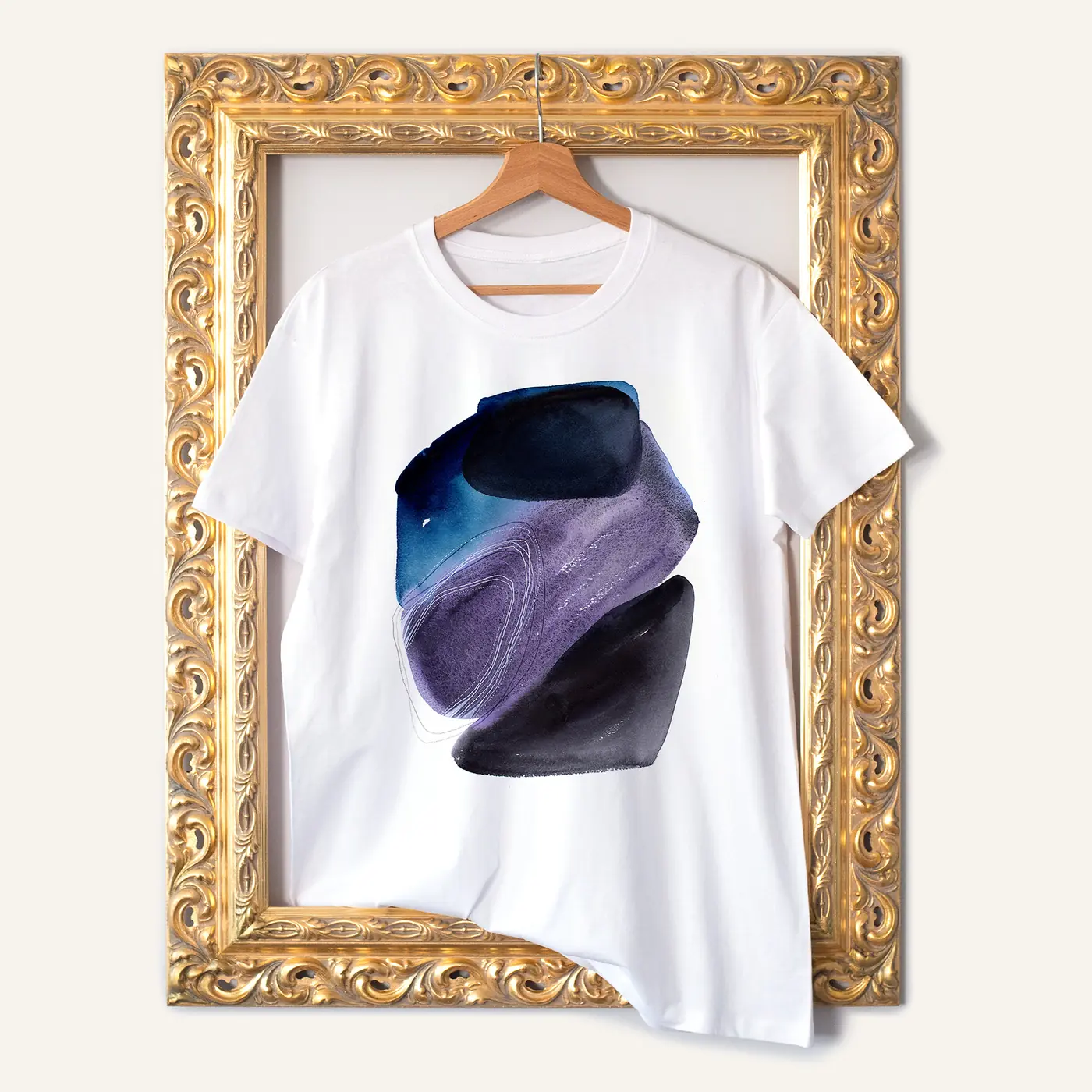White t-shirt with a watercolour abstract in purple and blue print