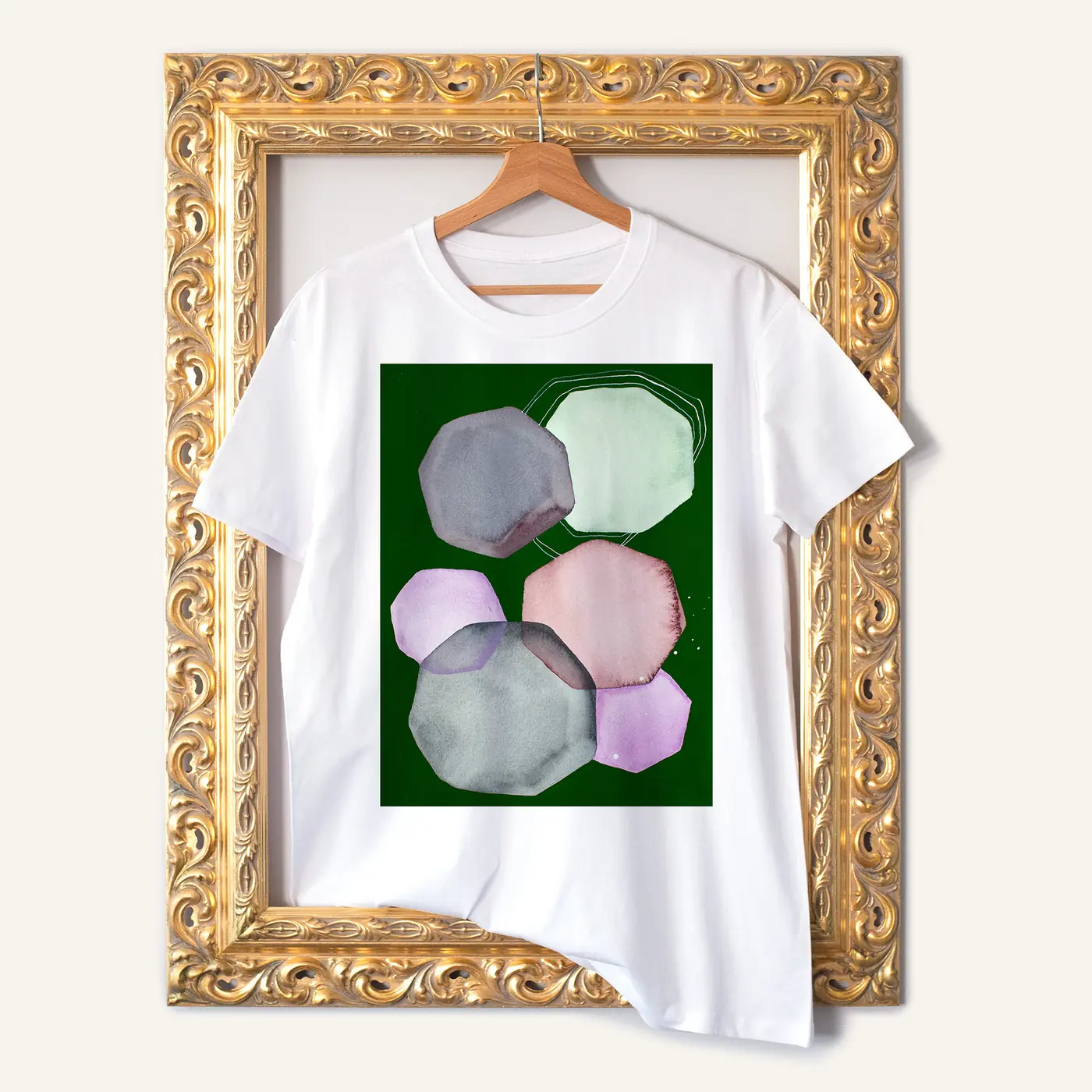 White t-shirt with a watercolour stones on dark green print