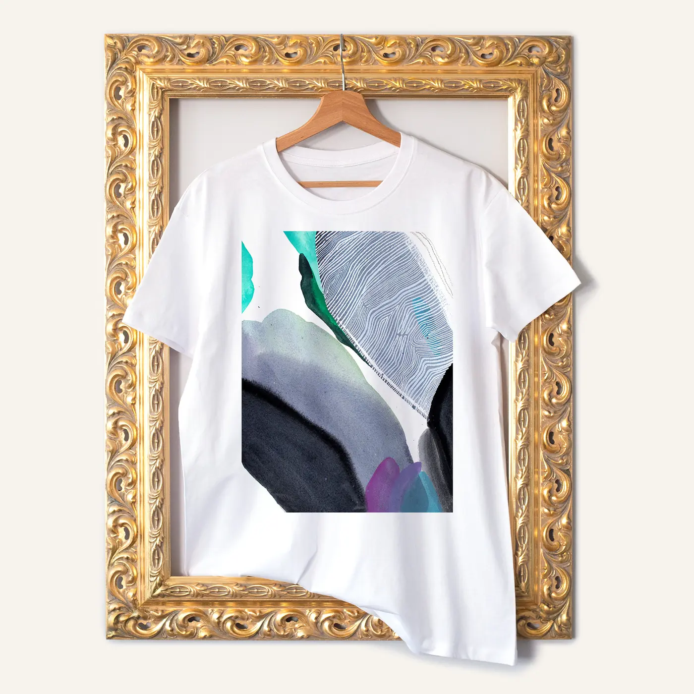 White t-shirt with a watercolour abstract in grey and teal print