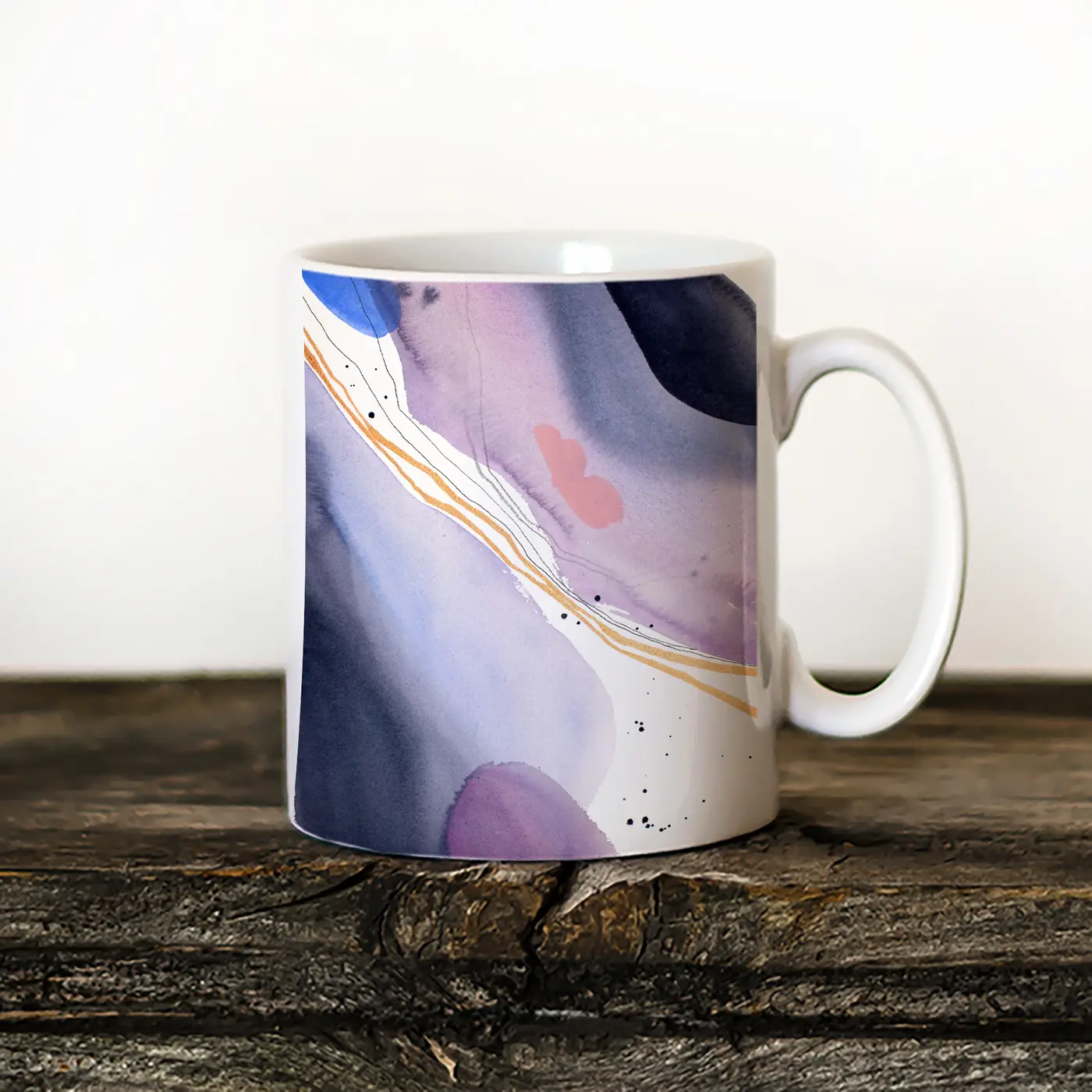 Ceramic mug with a watercolour abstract in lilac and gold print