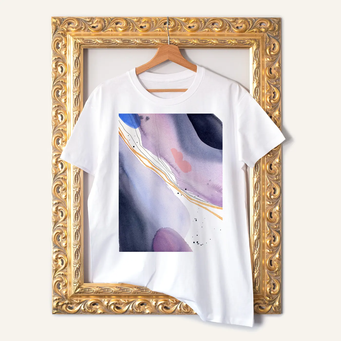 White t-shirt with a watercolour abstract in lilac and gold print