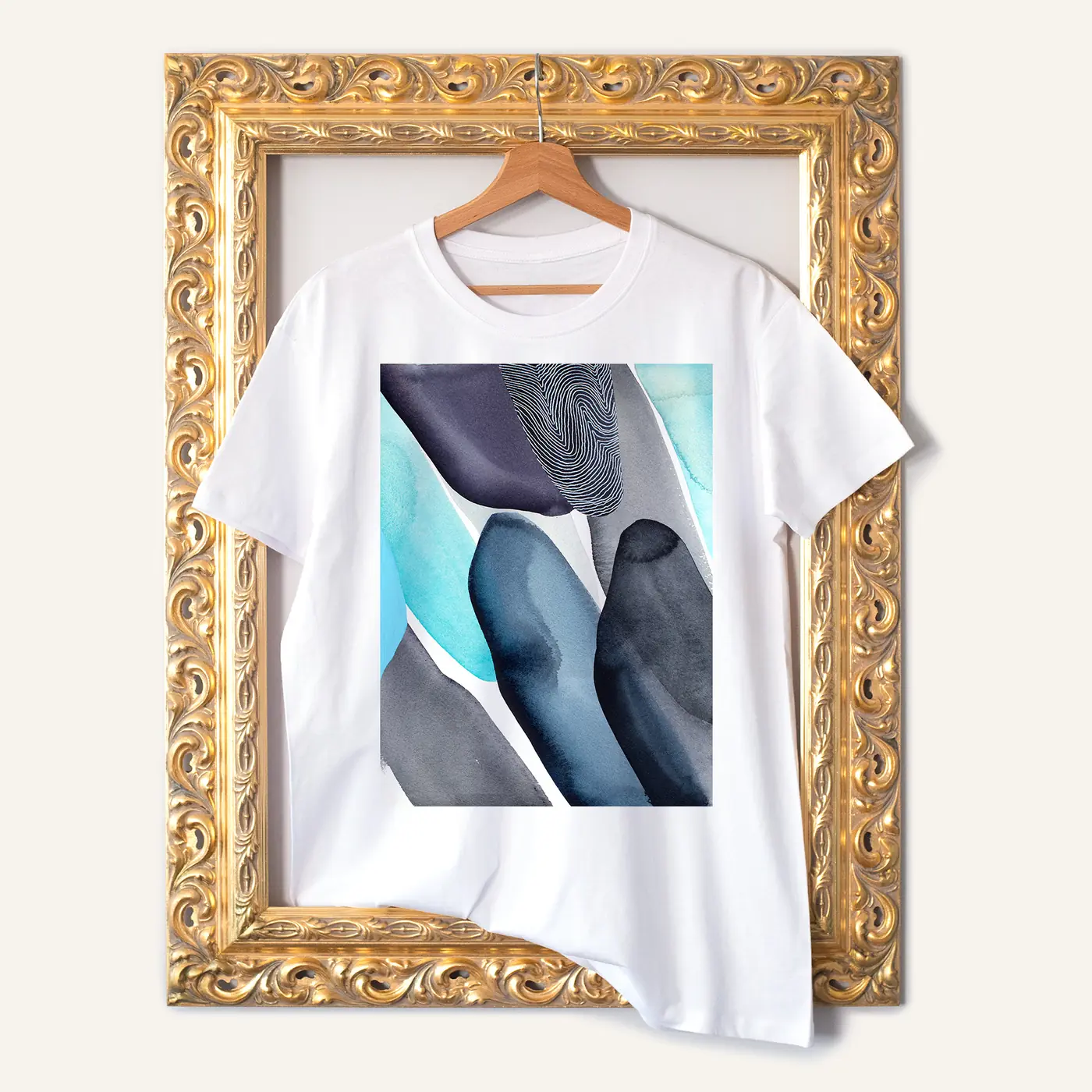 White t-shirt with a watercolour abstract in teal and graphite print