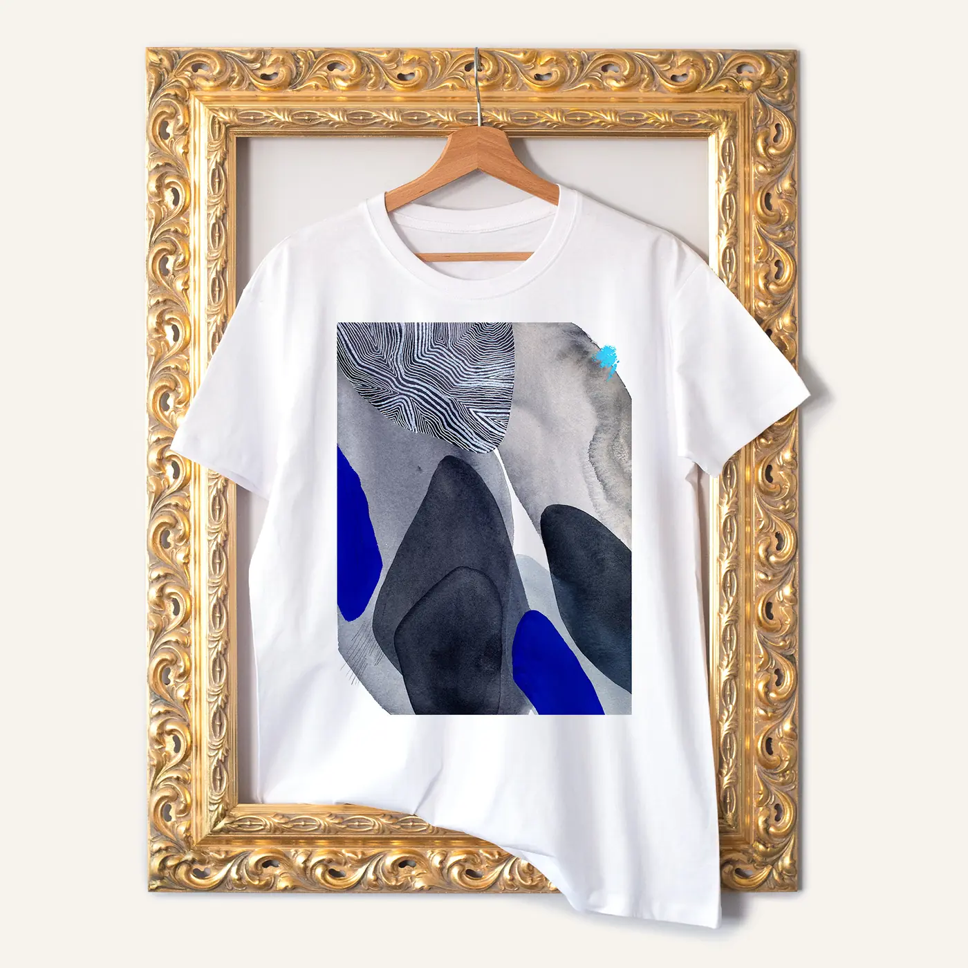 White t-shirt with a watercolour abstract in grey and cobalt print