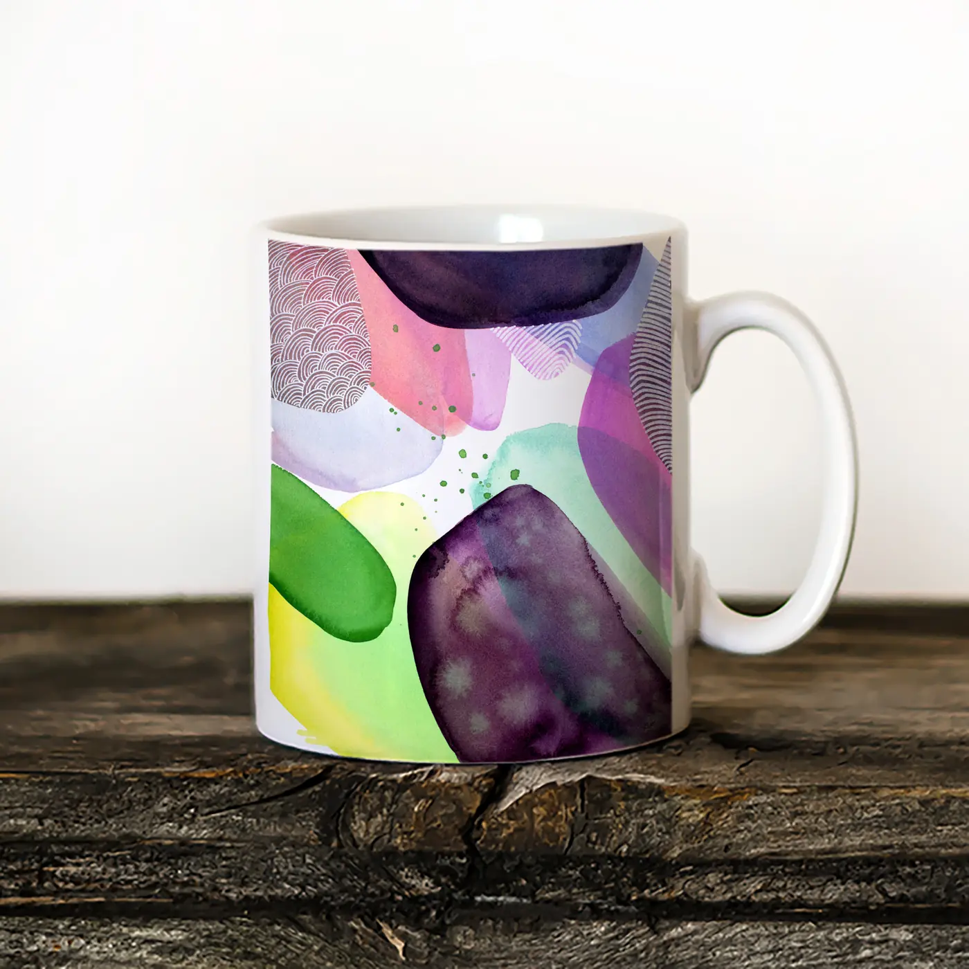 Ceramic mug with a watercolour abstract in pink and green print