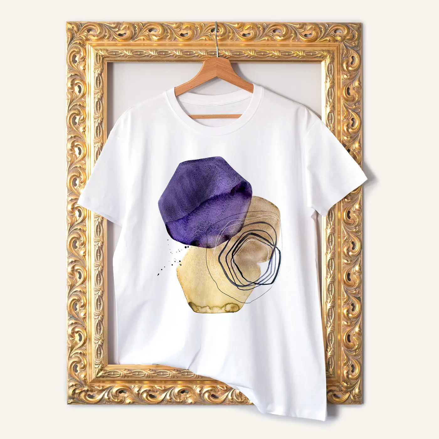 White t-shirt with a watercolour abstract in purple and cream print