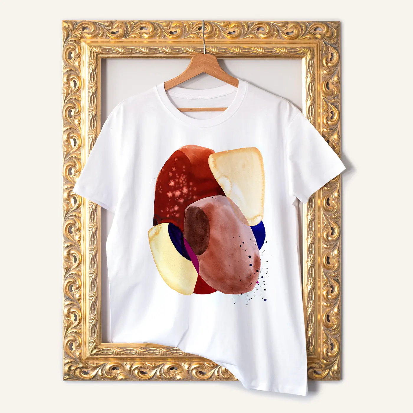 White t-shirt with a watercolour abstract in red and brown print