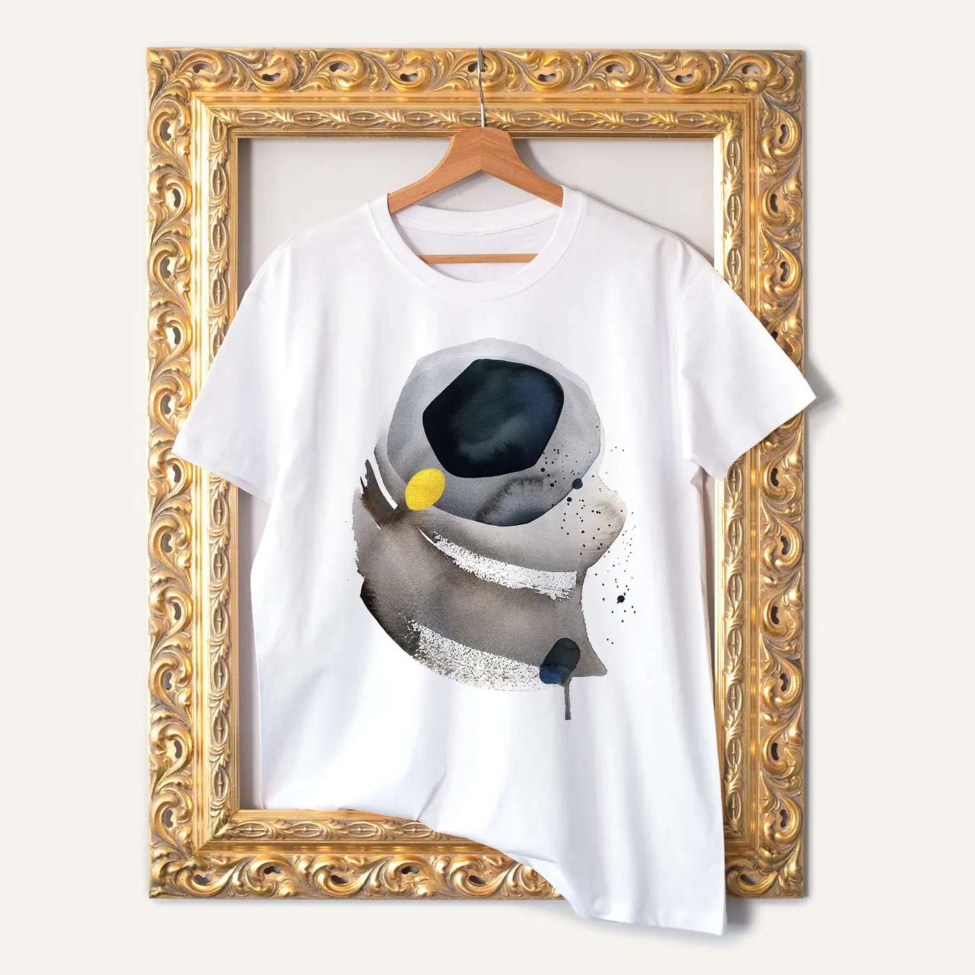 White t-shirt with a watercolour abstract in grey and black print