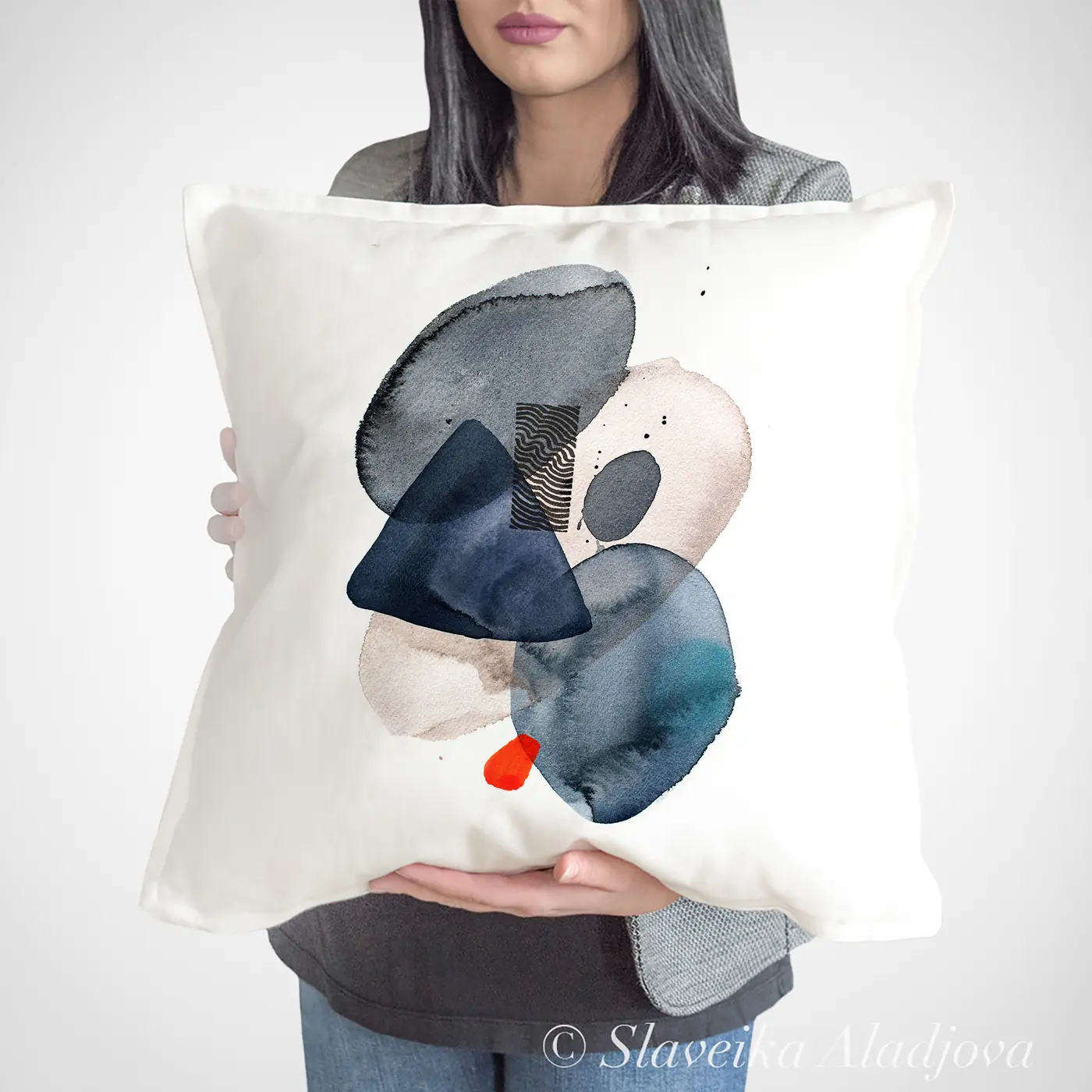 Cushion with a watercolour abstract in grey and graphite print