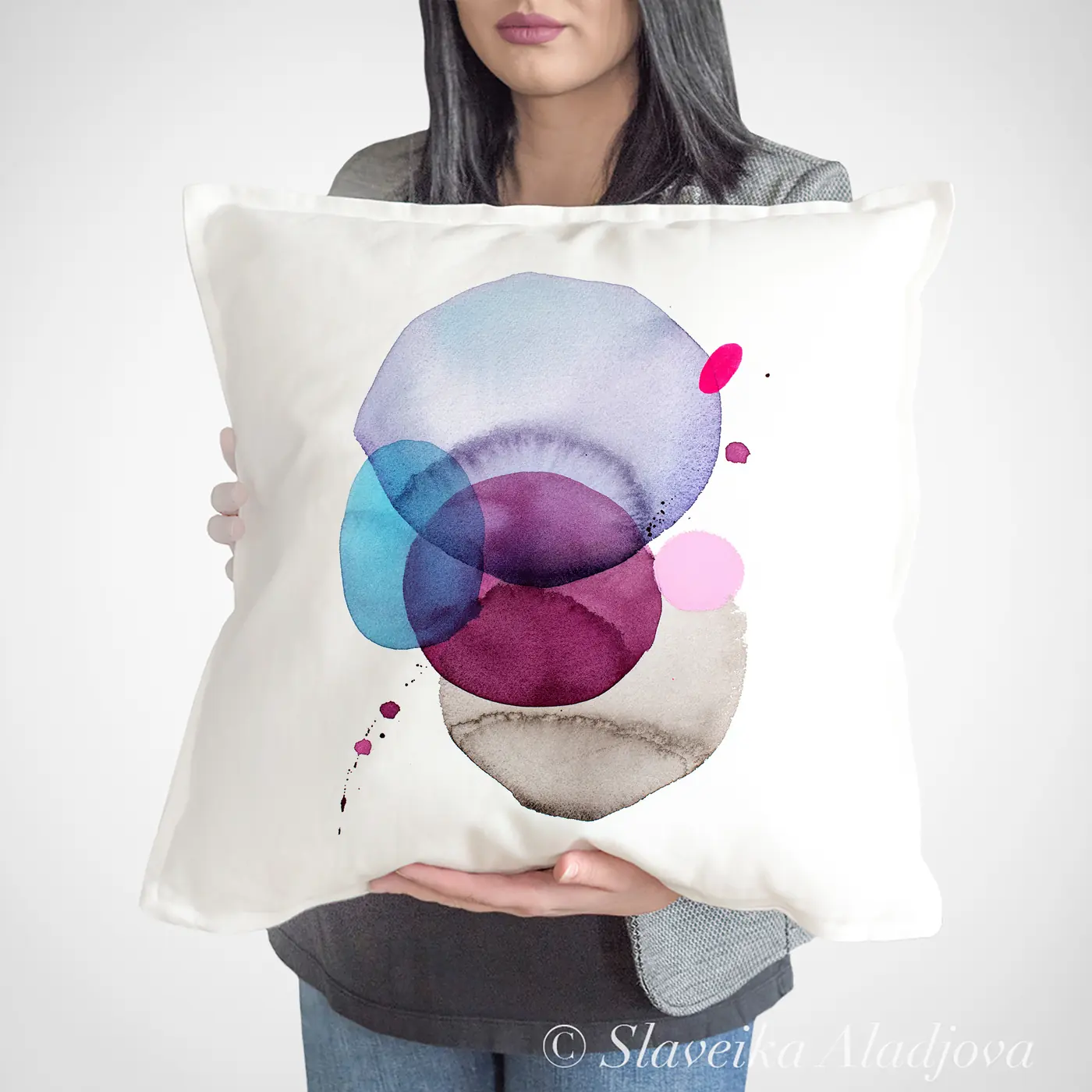 Cushion with a watercolour abstract in lilac and burgundy print