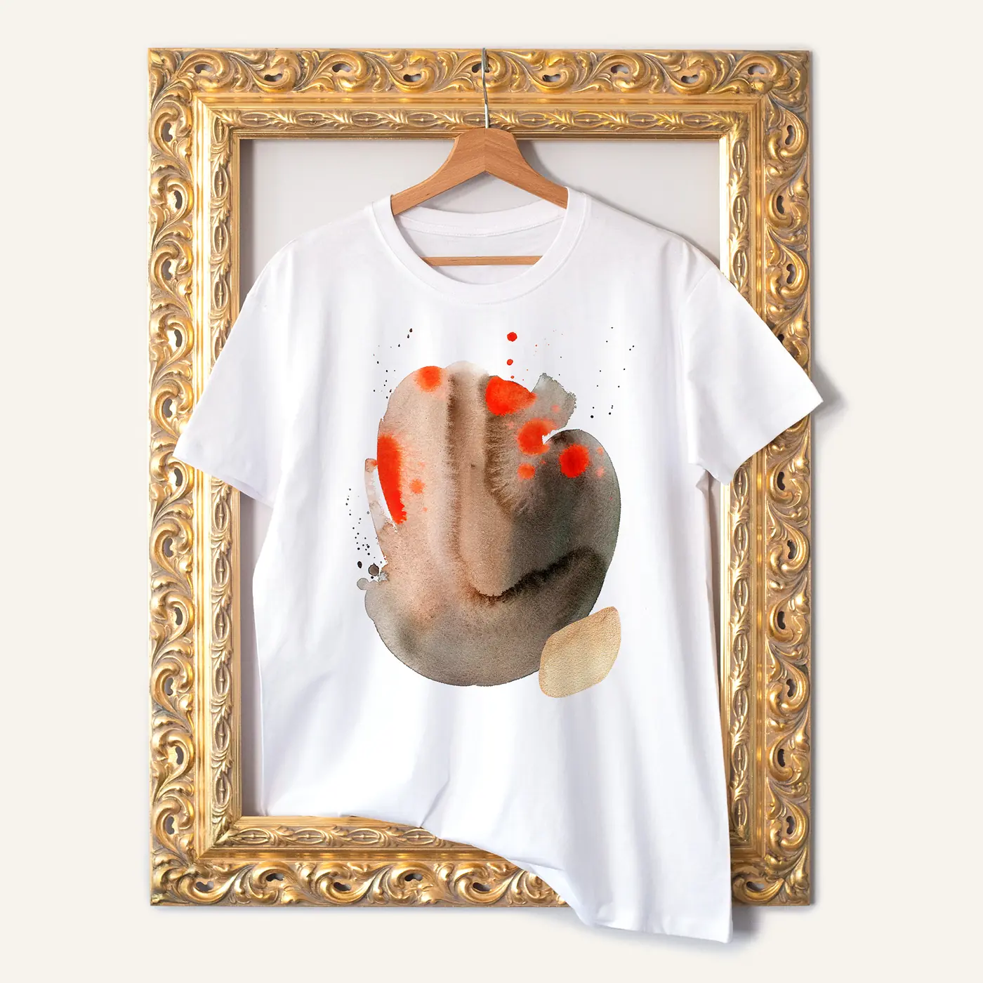 White t-shirt with a watercolour abstract in sand and orange print