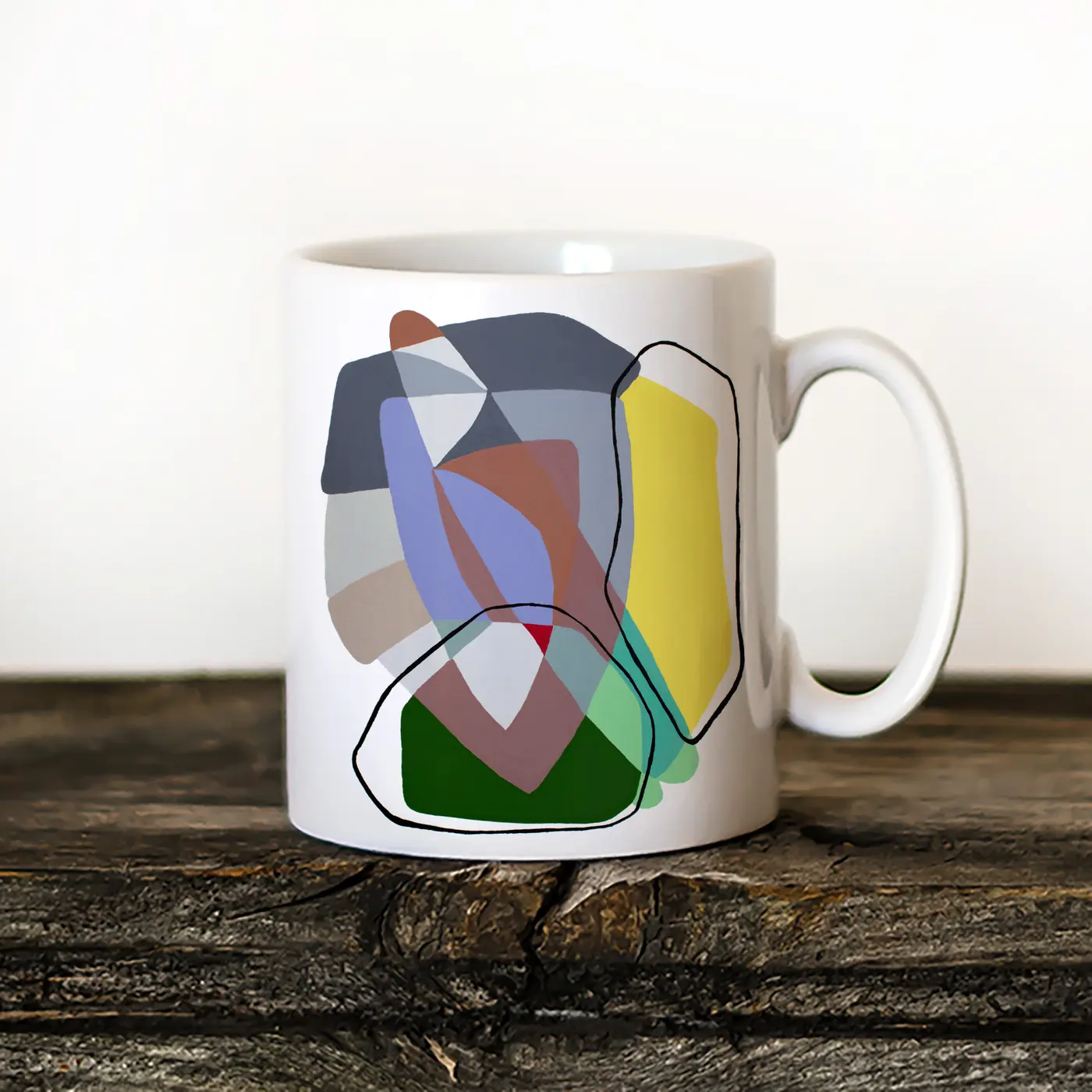 Ceramic mug with a watercolour abstract geometry in yellow print