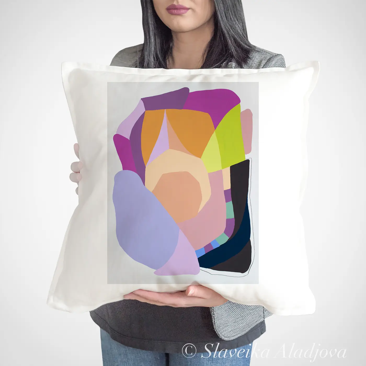 Cushion with a watercolour abstract in lilac and ochre print