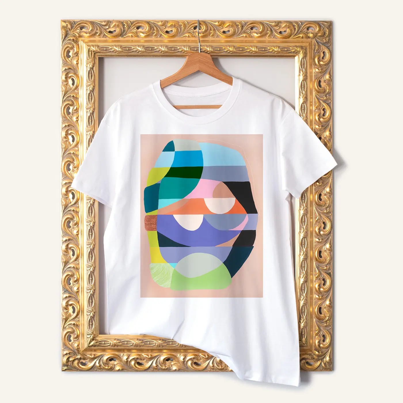 White t-shirt with a watercolour abstract in blue and coral print