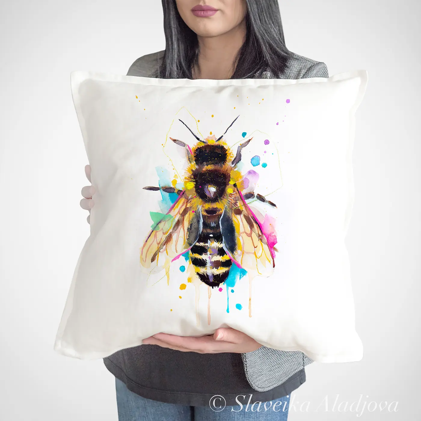 Cushion with a watercolour bee print