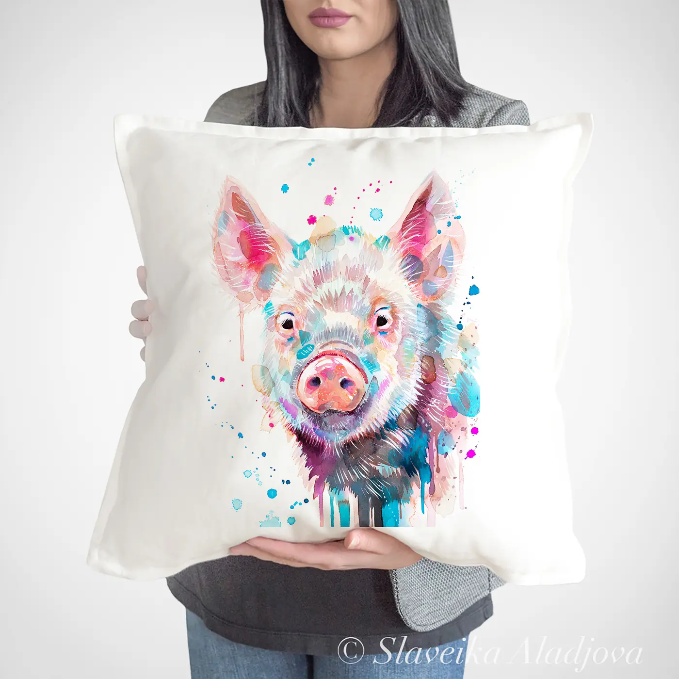 Cushion with a watercolour pink pig print