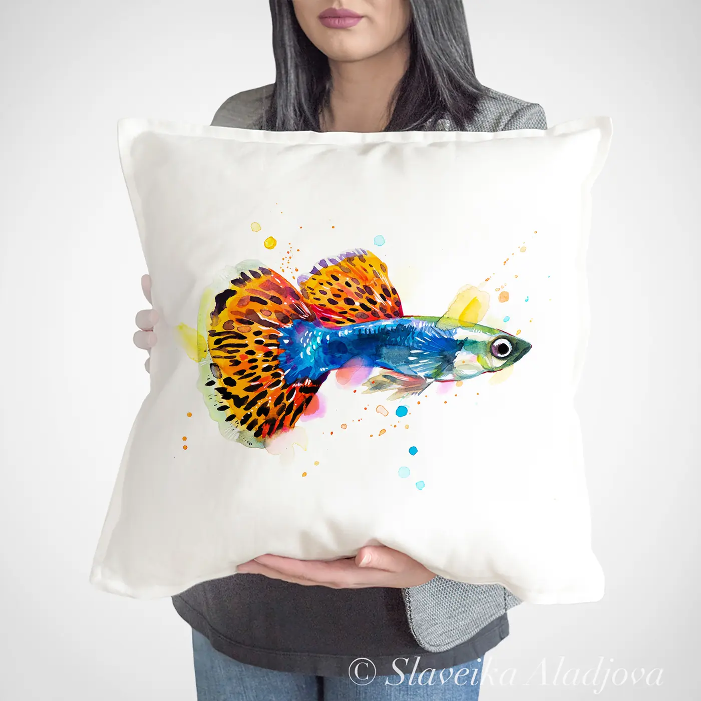 Cushion with a watercolour guppy fish print