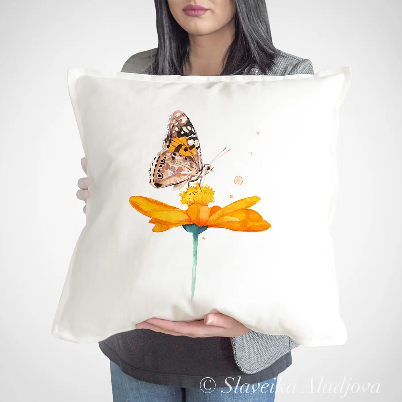 Cushion with a watercolour butterfly on a flower print
