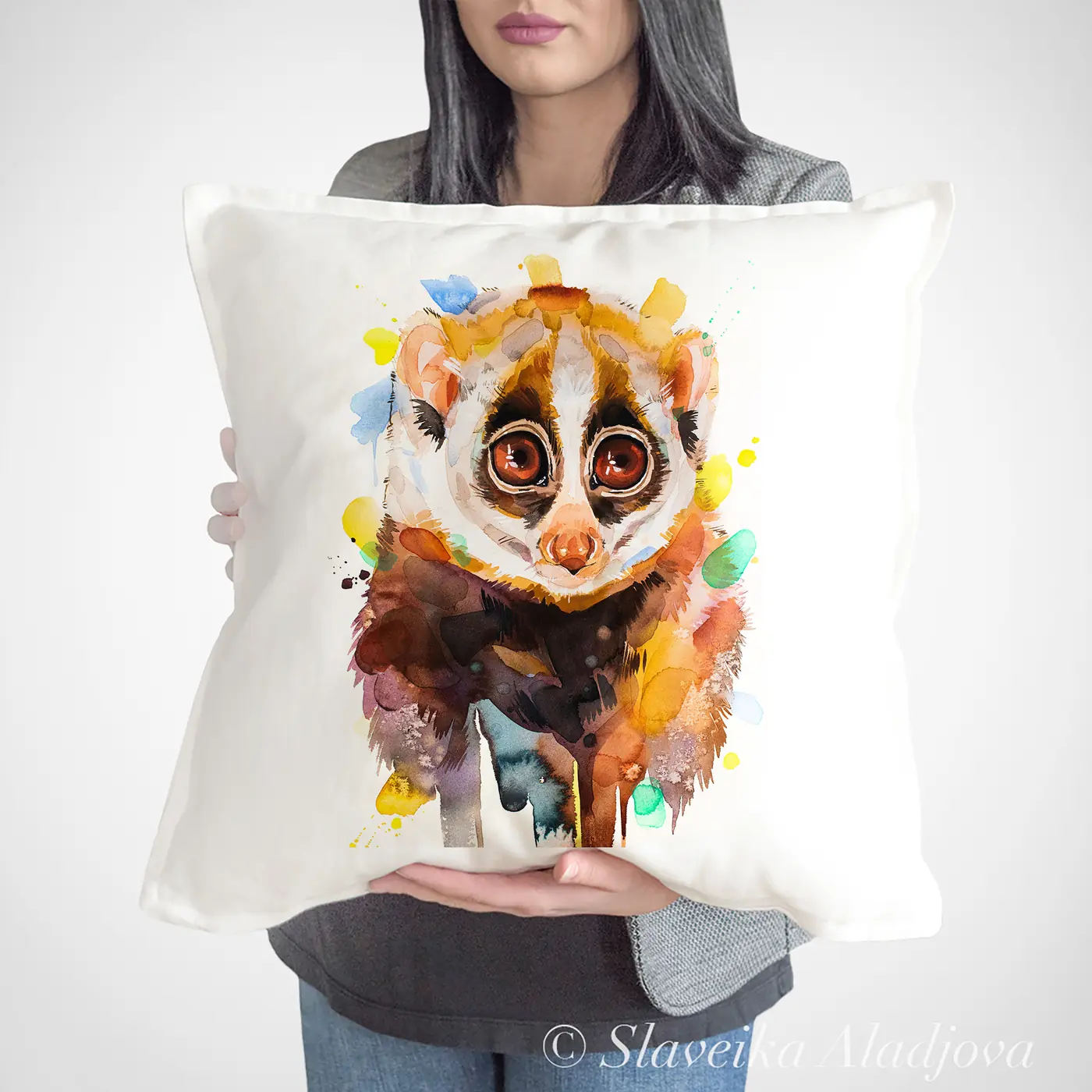 Cushion with a watercolour slow loris print
