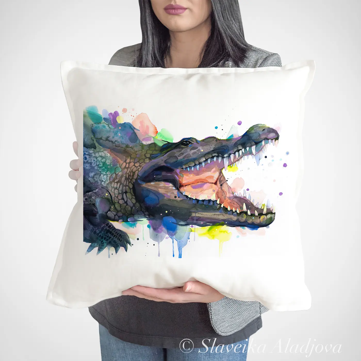 Cushion with a watercolour crocodile print