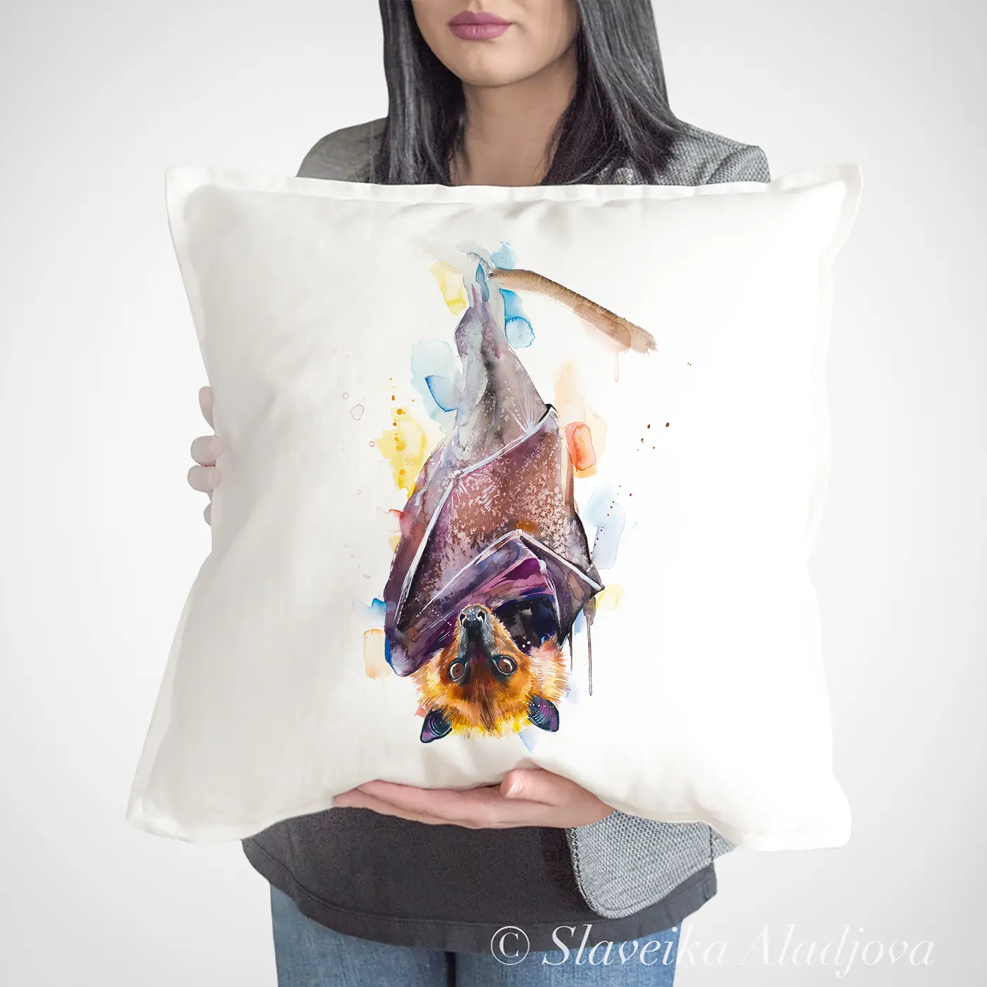 Cushion with a watercolour flying fox print
