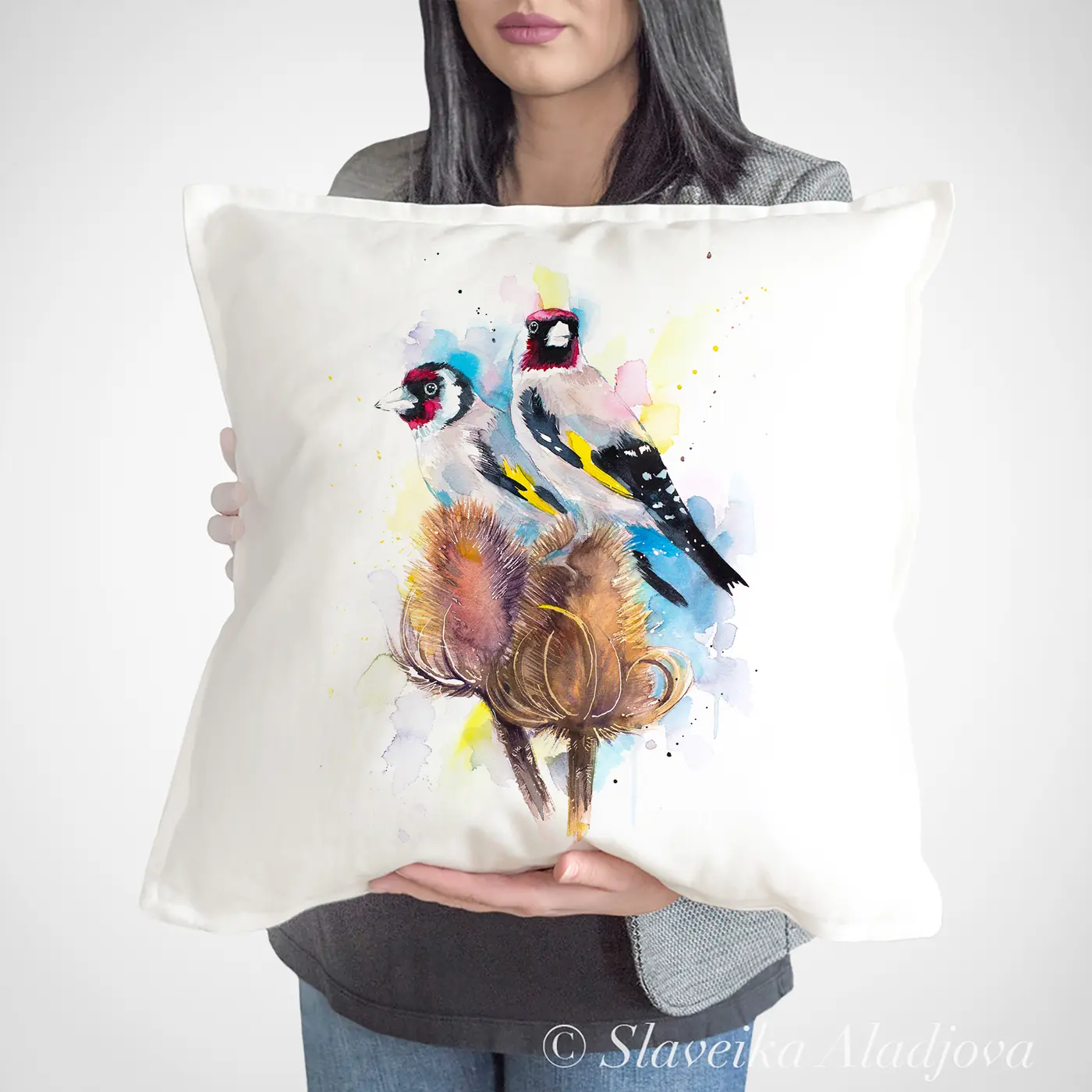 Cushion with a watercolour goldfinch print