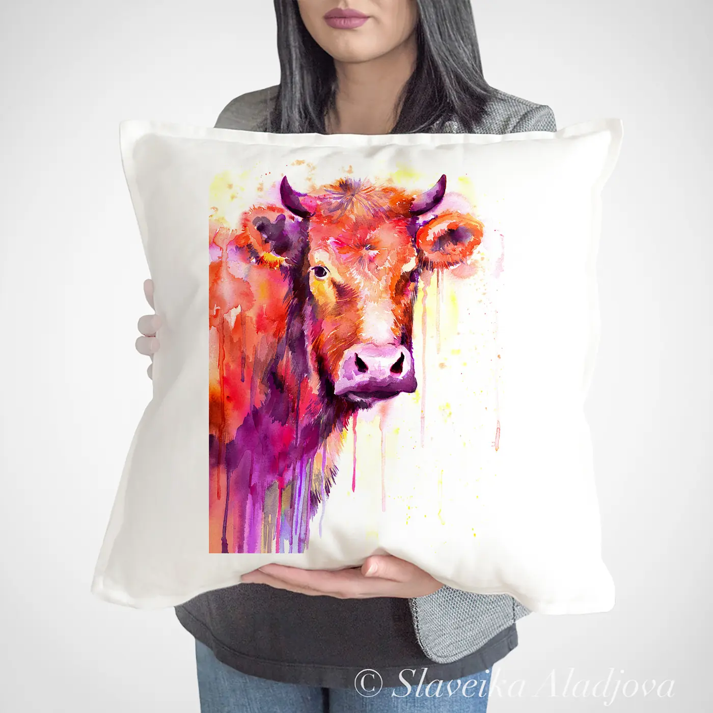 Cushion with a watercolour red cow print
