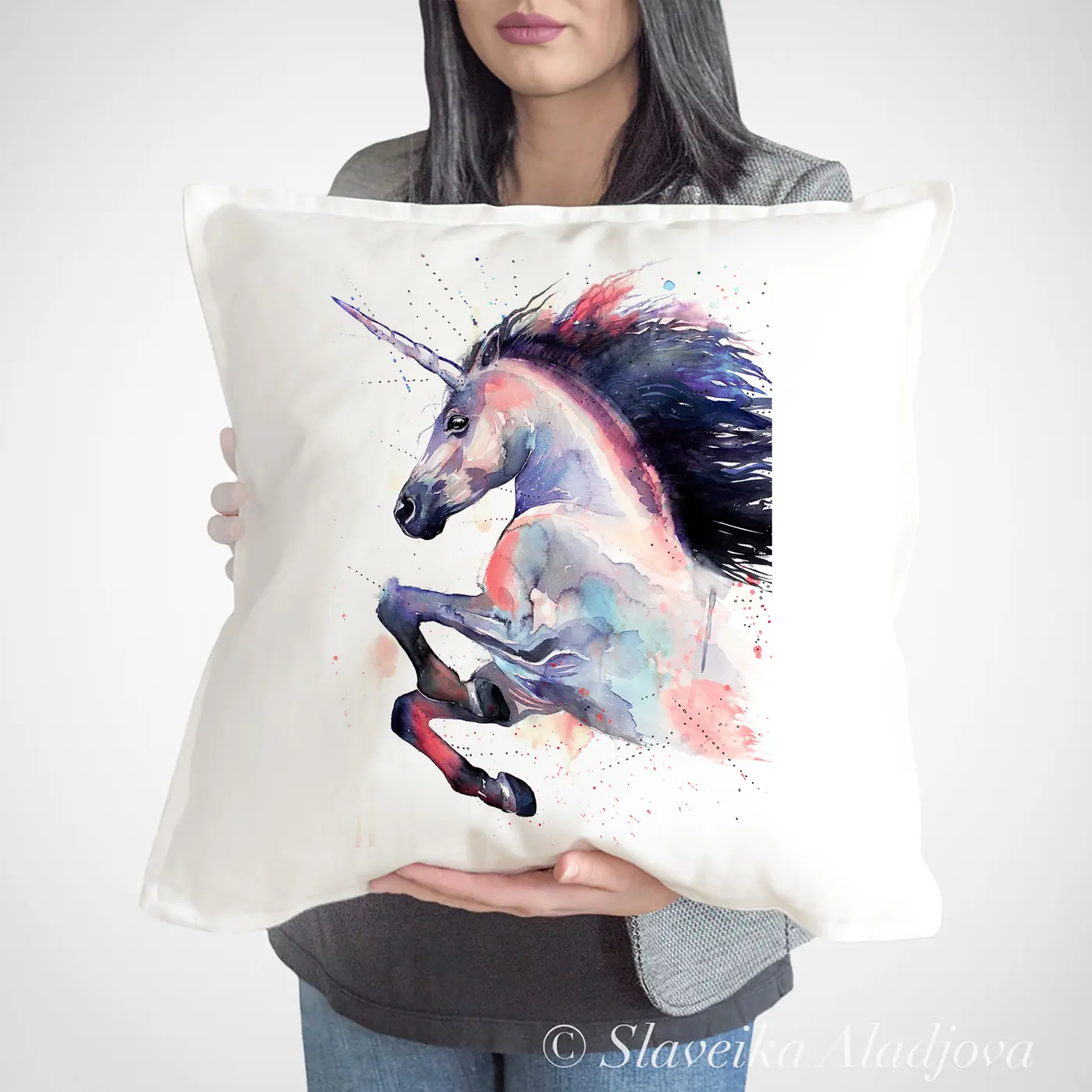 Cushion with a watercolour unicorn print