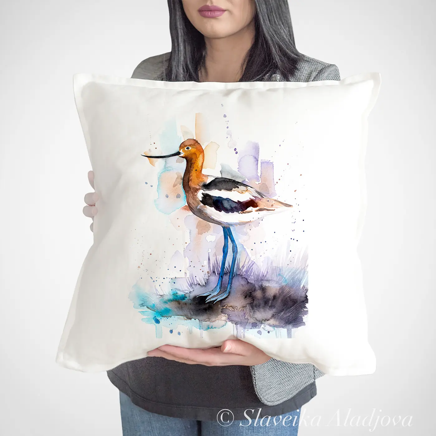 Cushion with a watercolour american avocet print