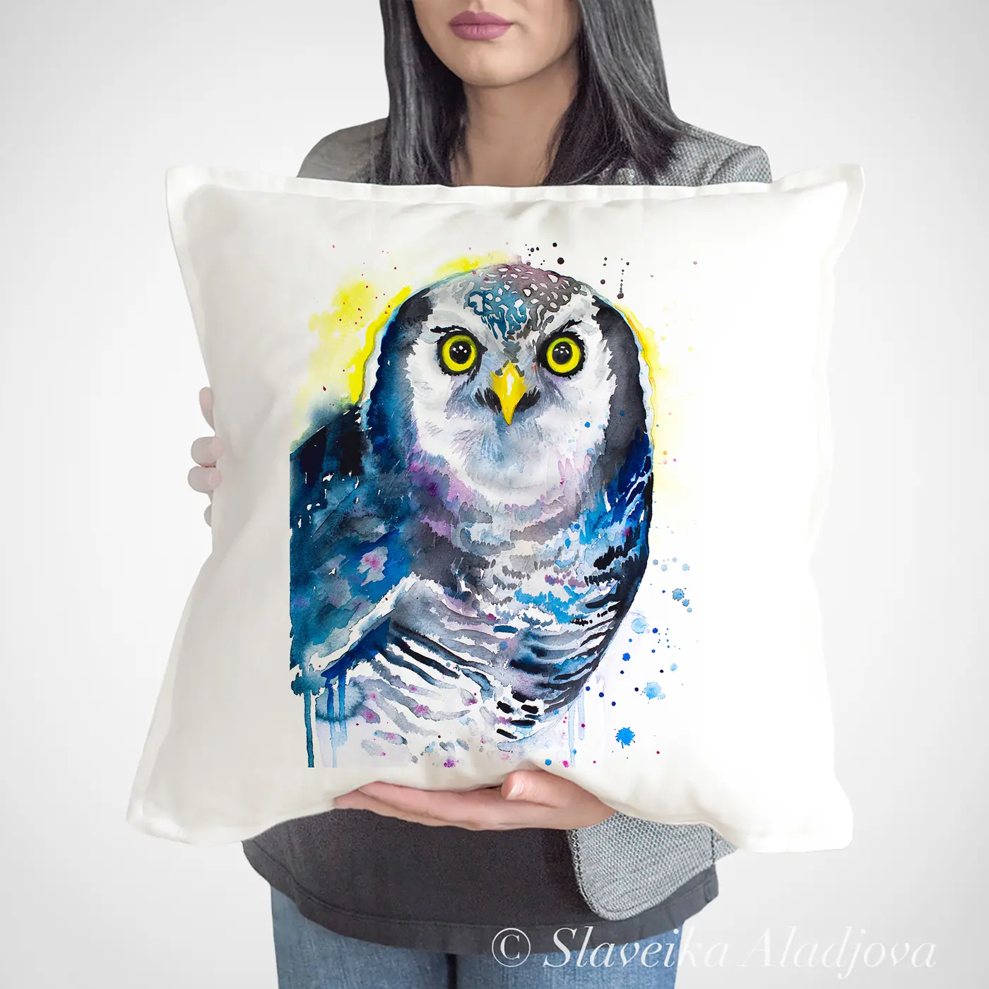 Cushion with a watercolour hawk owl print