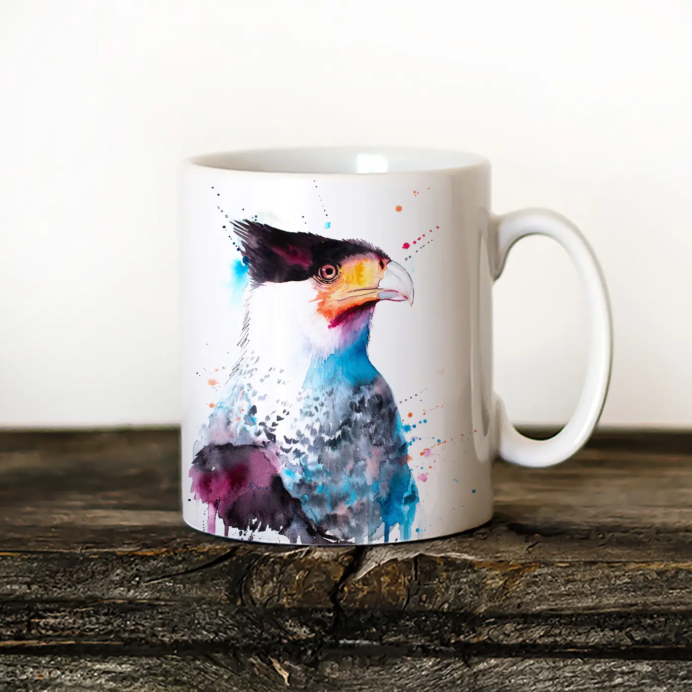 Ceramic mug with a watercolour caracara print