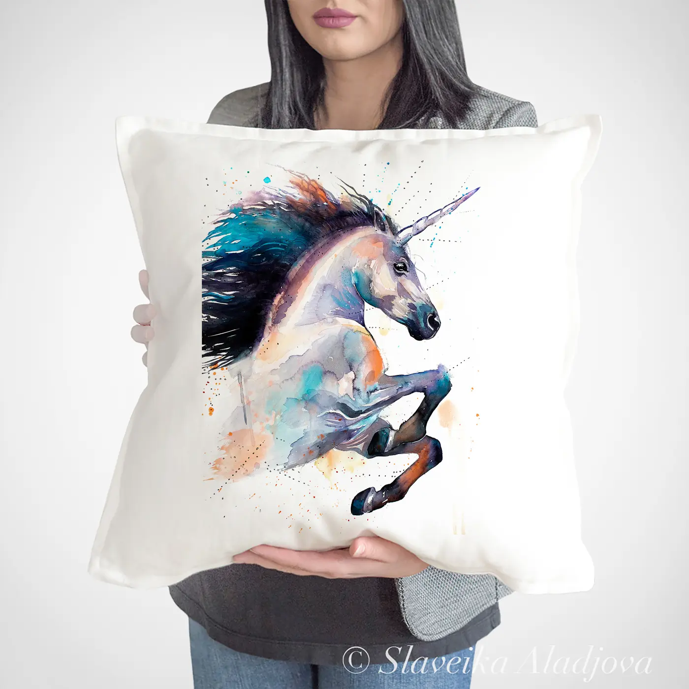 Cushion with a watercolour unicorn print