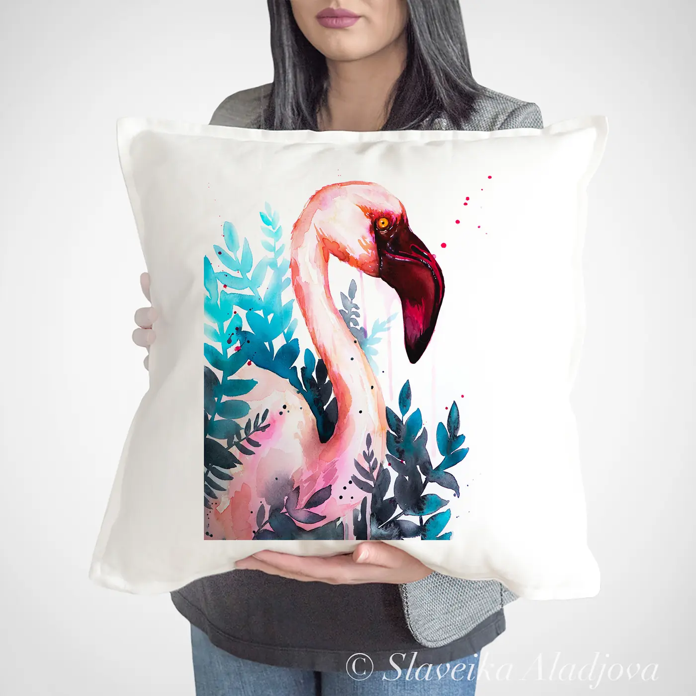 Cushion with a watercolour flamingo print
