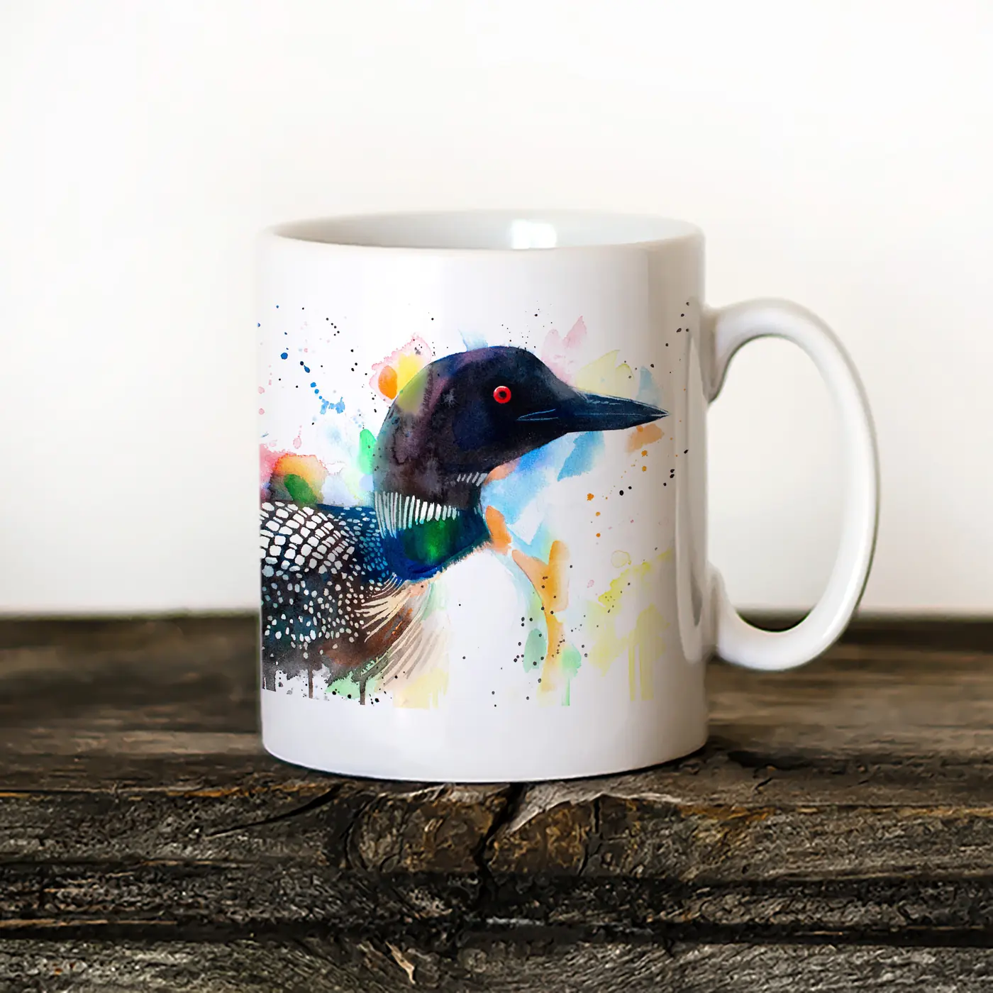 Ceramic mug with a watercolour common loon print