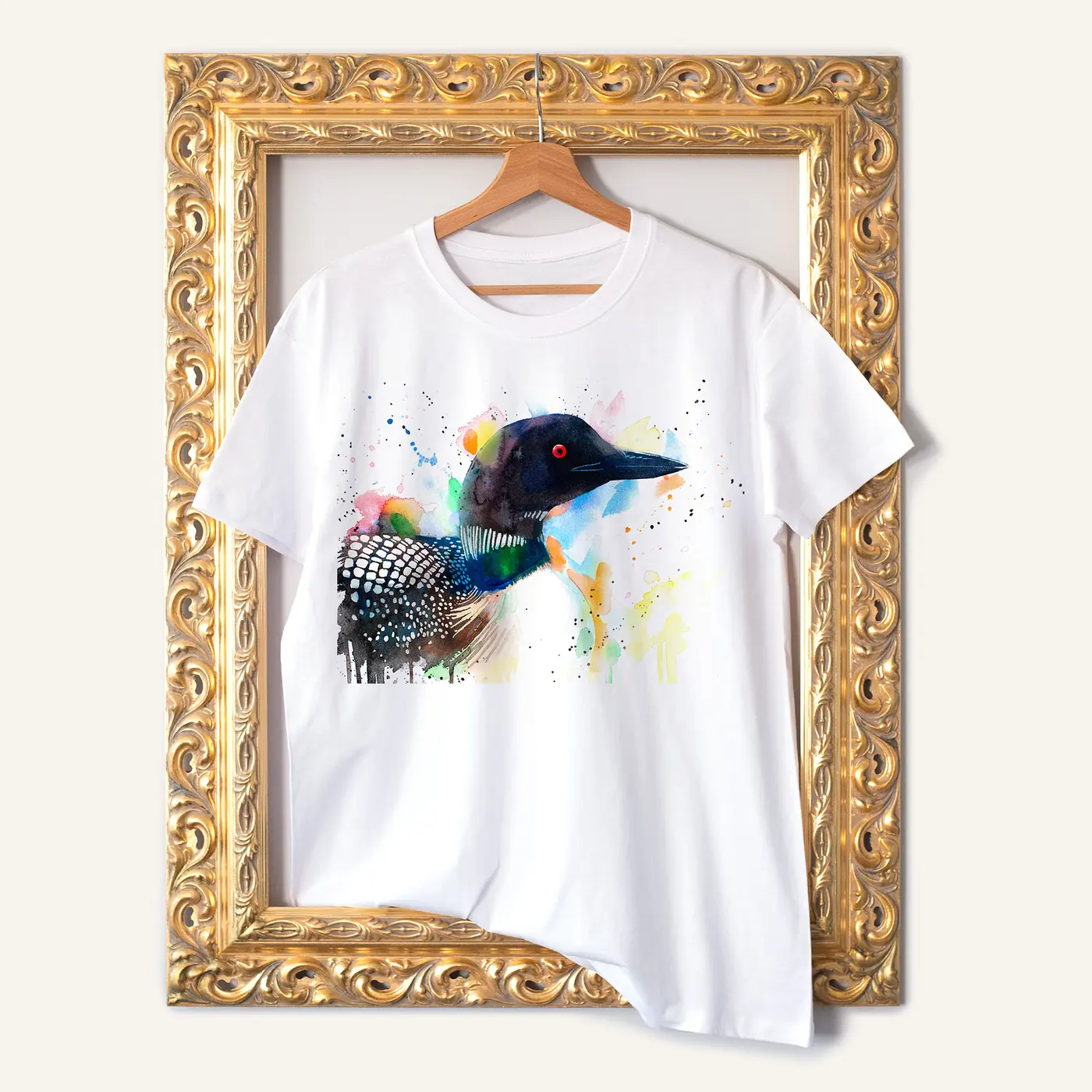 White t-shirt with a watercolour common loon print