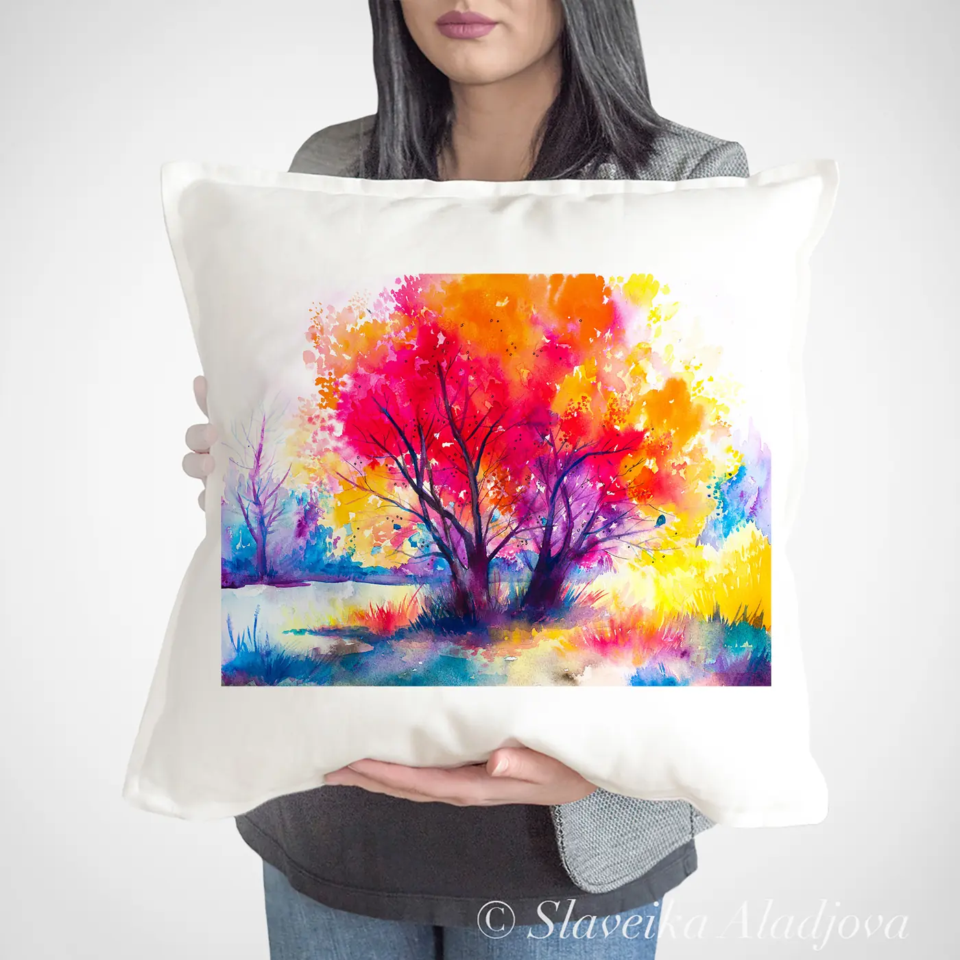 Cushion with a watercolour colourful tree print