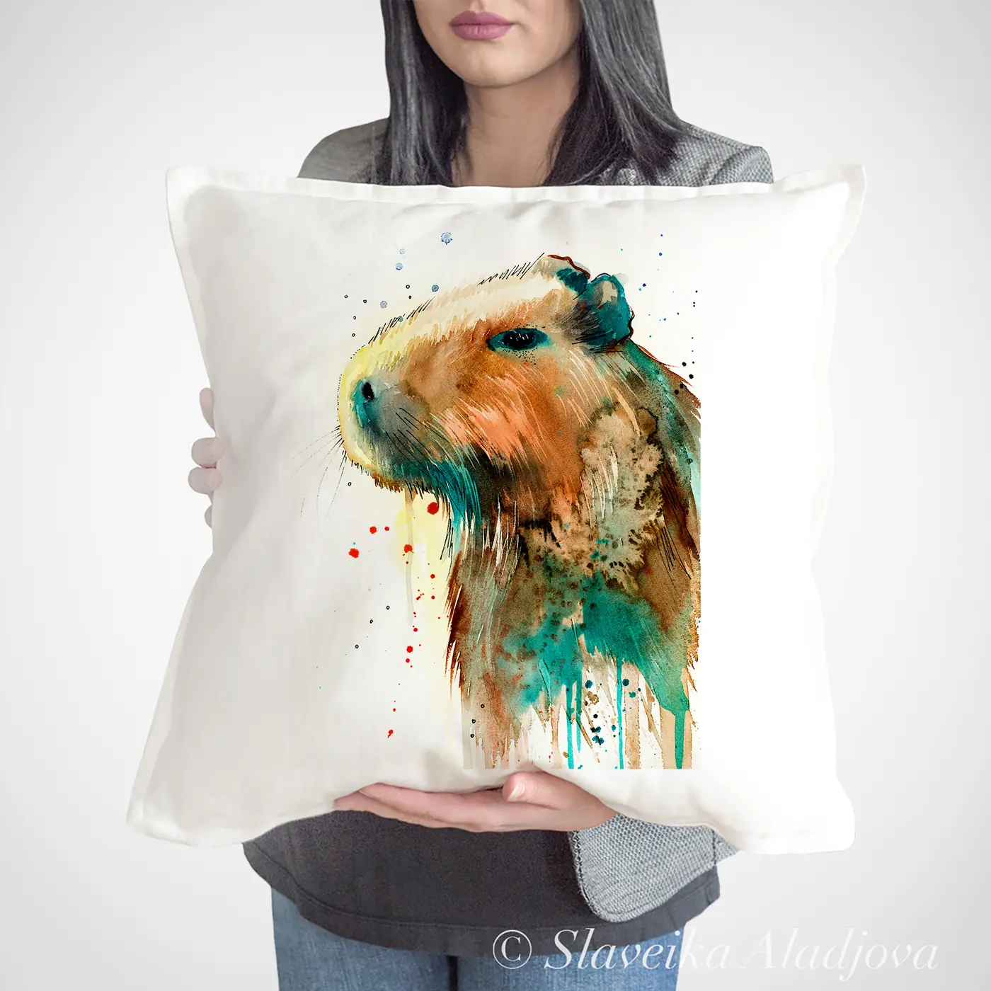 Cushion with a watercolour capybara print