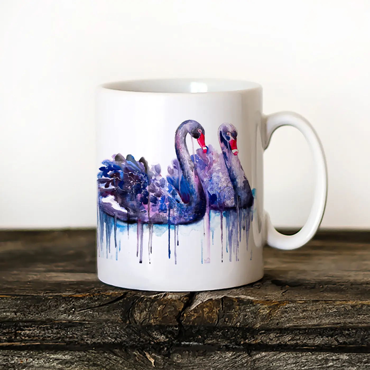 Ceramic mug with a watercolour black swans print