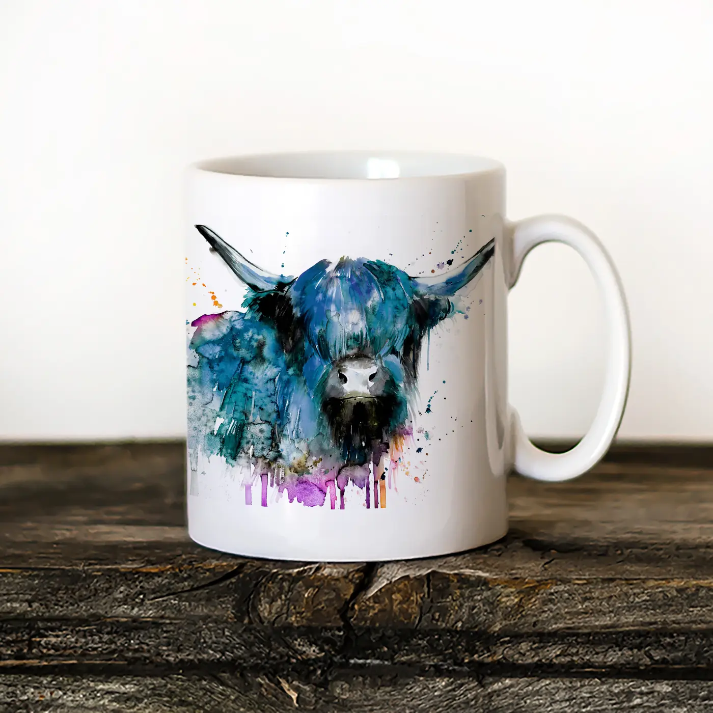 Ceramic mug with a watercolour highland cow print