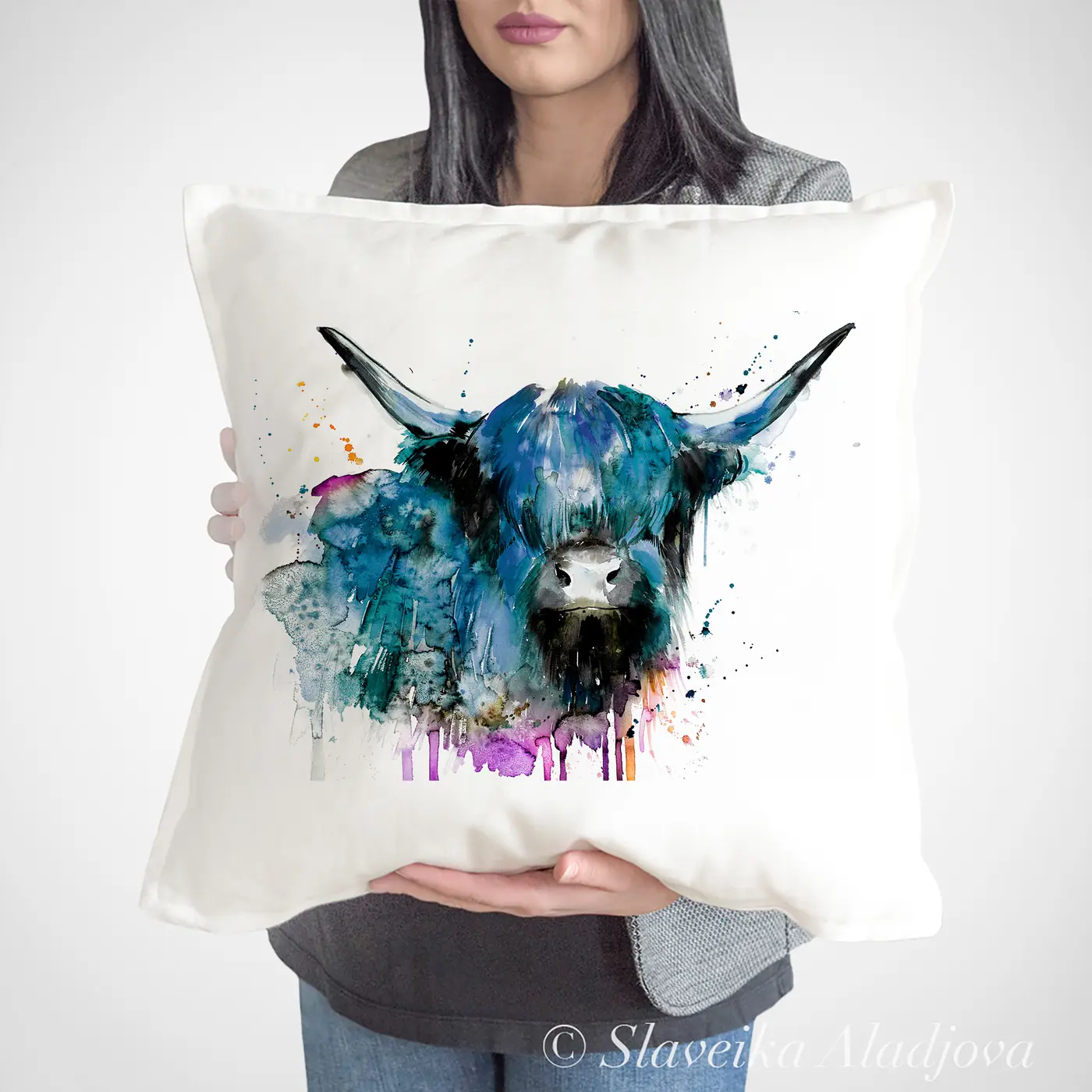 Cushion with a watercolour highland cow print