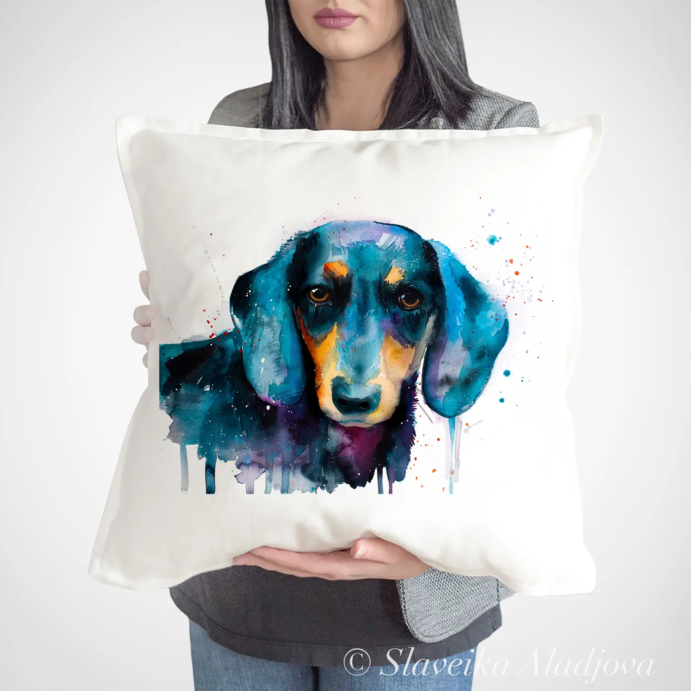 Cushion with a watercolour black dachshund print