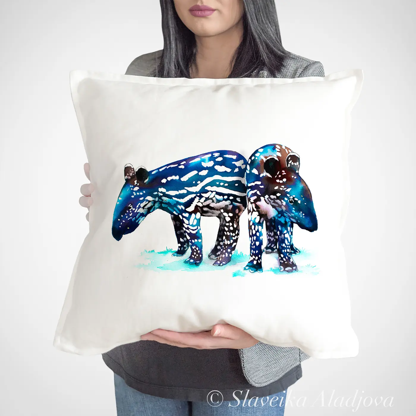Cushion with a watercolour baby tapirs print